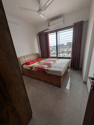 Bedroom in 2 BHK Apartment at Unique Youtopia, Kharadi – for Rent