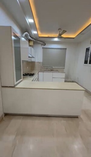 Kitchen in 4 BHK Builder Floor at Ansal API Versalia, Sector 67a – for Rent