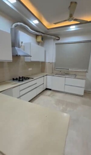 Kitchen in 4 BHK Builder Floor at Ansal API Versalia, Sector 67a – for Rent