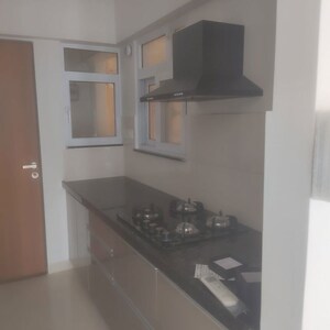 Kitchen in 2 BHK Apartment at Gera World of Joy, Kharadi – for Rent