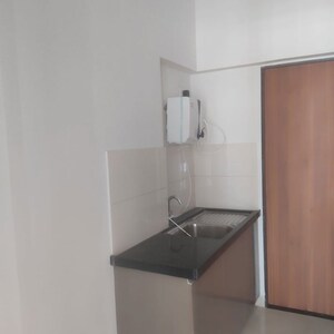 Kitchen in 2 BHK Apartment at Gera World of Joy, Kharadi – for Rent