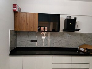 Kitchen in 2 BHK Apartment at Gera World of Joy, Kharadi – for Rent