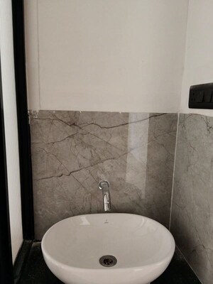 Bathroom in 2 BHK Apartment at Gera World of Joy, Kharadi – for Rent