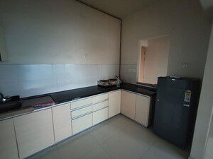Kitchen in 2 BHK Apartment at Gera World of Joy, Kharadi – for Rent