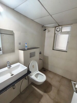 Bathroom in 2 BHK Apartment at Gera World of Joy, Kharadi – for Rent