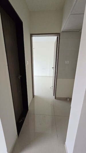 Building Lobby in 1 BHK Apartment at Paranjape Trident Towers, Wakad – for Rent