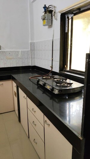 Kitchen in 2 BHK Apartment at Prabhat CHS, Andheri West – for Rent