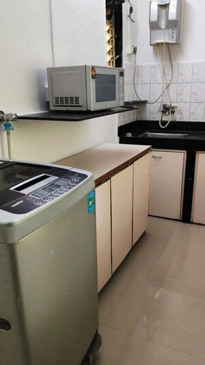 Kitchen in 2 BHK Apartment at Prabhat CHS, Andheri West – for Rent