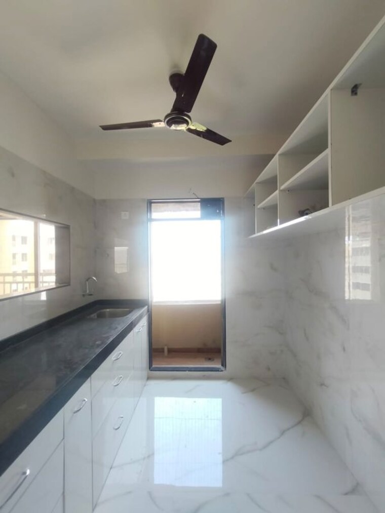 Kitchen, ram-pushpanjali-residency 3 Bedroom 920 Sq.Ft. Apartment In Owale Thane 10513143