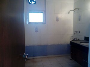 Bathroom in 3 BHK Apartment at Malviya Nagar – for Rent