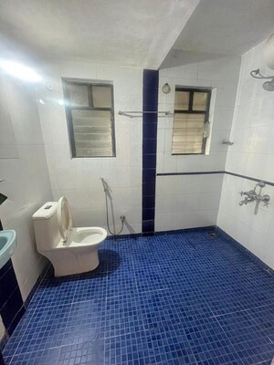 Bathroom in 2 BHK Apartment at Dhanlaxmi Park, Kothrud – for Rent