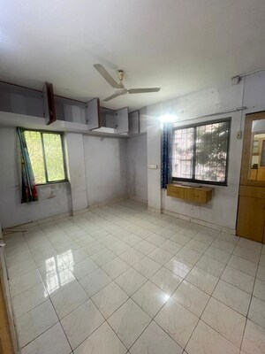 Bedroom in 2 BHK Apartment at Dhanlaxmi Park, Kothrud – for Rent