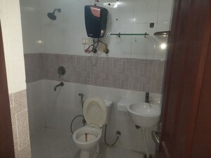 Bathroom in 3 BHK Apartment at Arun Vihar Sector 37, Sector 37 – for Rent