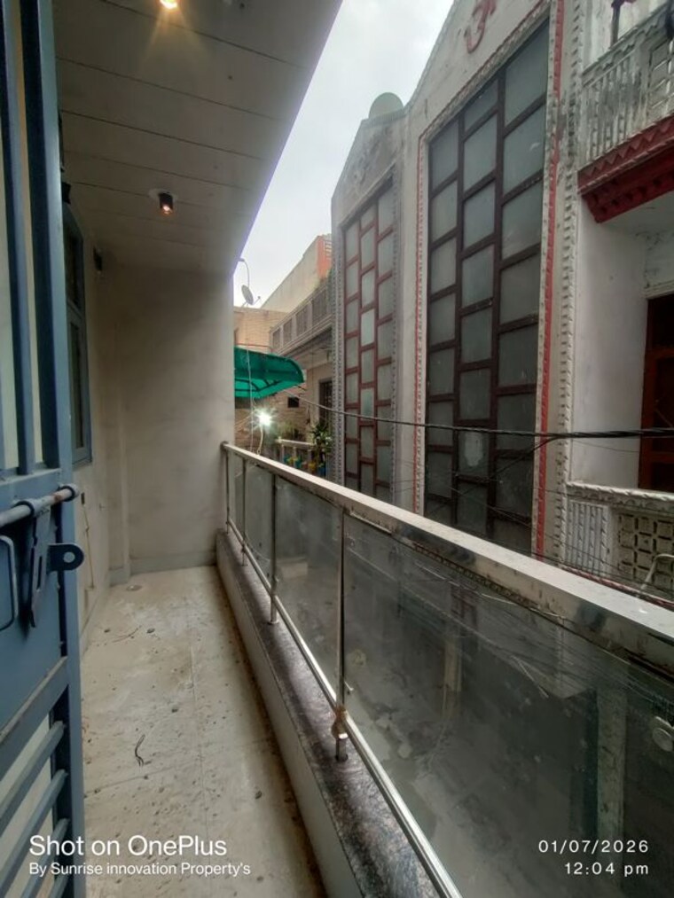Balcony, dwarka mor 2 Bedroom 60 Sq.Yd. Builder Floor In Dwarka Mor Delhi 10513621