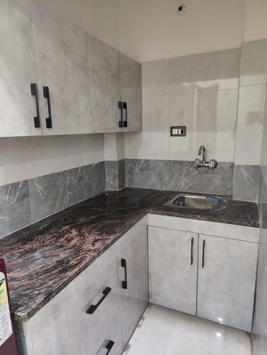 Kitchen in Studio Builder Floor at Sushant Lok I – for Rent