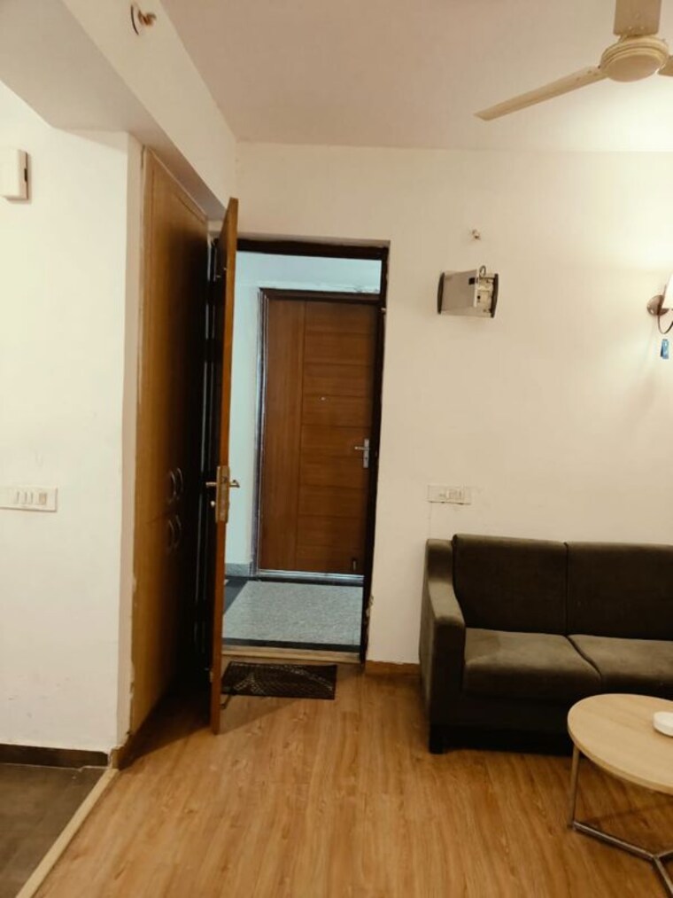 Living Room, nimbus-the-golden-palm 1 Bedroom 555 Sq.Ft. Apartment In Sector 168 Noida 10513729