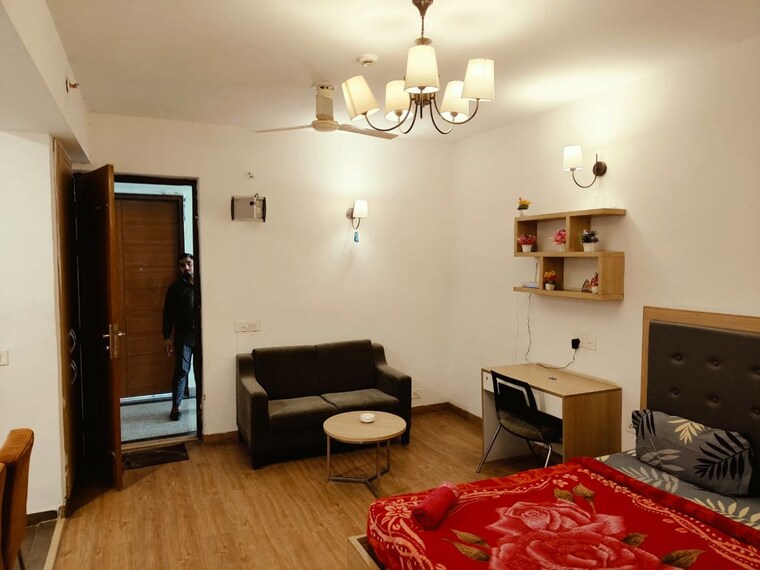 Living Room, nimbus-the-golden-palm 1 Bedroom 555 Sq.Ft. Apartment In Sector 168 Noida 10513729