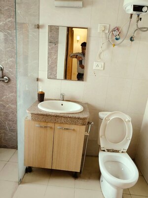 Bathroom in 1 BHK Apartment at Nimbus The Golden Palm, Sector 168 – for Rent
