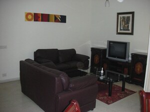 Living Room in 2 BHK Apartment at Prestige Monte Carlo, Yelahanka – for Sale