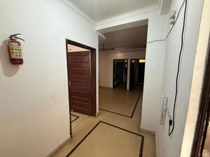 Building Lobby in 3 BHK Apartment at The Bhagwati CGHS, Sector 22 Dwarka – for Rent