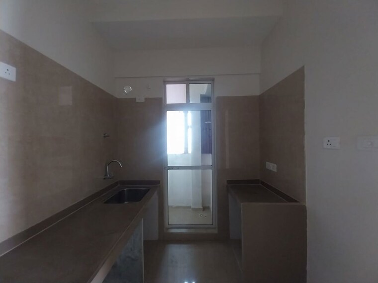 Kitchen, dosti-west-county 3 Bedroom 950 Sq.Ft. Apartment In Balkum Pada Thane 10513892