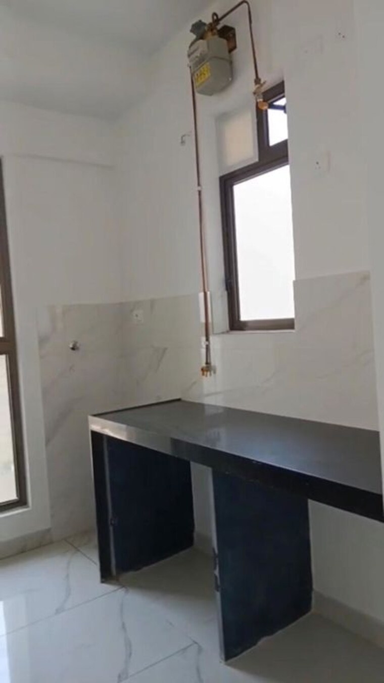 Kitchen, raymond-ten-x-habitat 1 Bedroom 420 Sq.Ft. Apartment In Pokhran Road No Two Thane 10513991