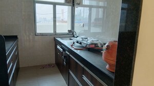 Kitchen in 1 BHK Apartment at Bharat Belmonte, Andheri West – for Sale