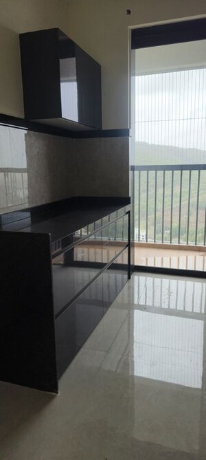 Kitchen in 2 BHK Apartment at Dhamji Shamji Mahavir Spring Tulip Phase 1, Pokhran Road No Two – for Rent