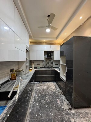 Kitchen in 4 BHK Builder Floor at Sarvodaya Enclave – for Sale