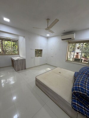 Bedroom in 2 BHK Apartment at Ajmera Prive, Juhu – for Rent