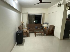 Living Room in 2 BHK Apartment at Nancy Bramha CHS, Bavdhan – for Rent