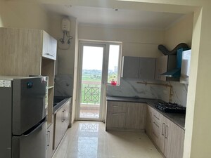 Kitchen in 3 BHK Apartment at Affinity Greens, International Airport Road – for Rent