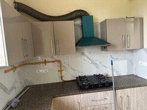 Kitchen in 3 BHK Apartment at Affinity Greens, International Airport Road – for Rent