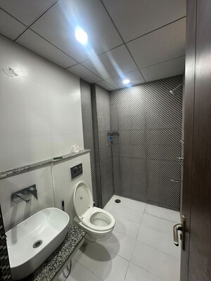 Bathroom in 3 BHK Apartment at Affinity Greens, International Airport Road – for Rent