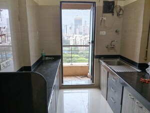 Kitchen in 2 BHK Apartment at Raheja Interface Heights, Malad West – for Rent