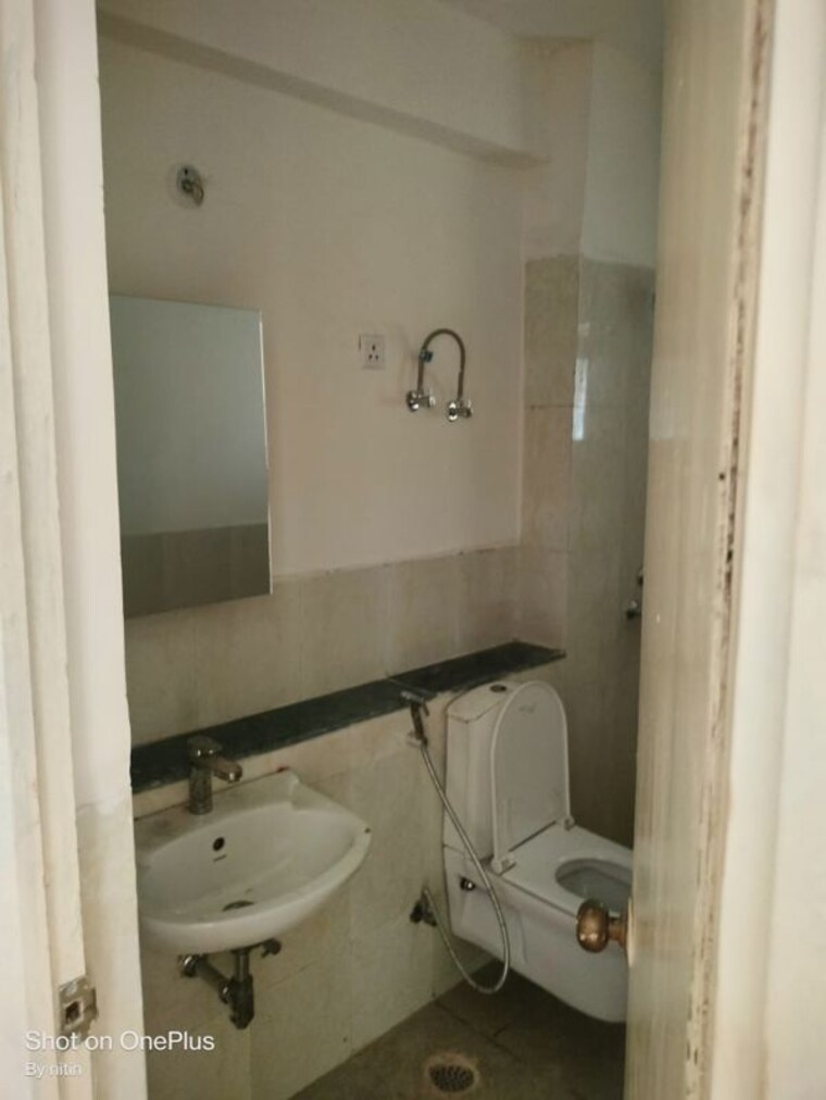 Bathroom, jaypee-greens-kosmos 2 Bedroom 850 Sq.Ft. Apartment In Sector 134 Noida 10514220