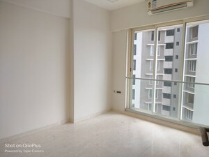 Room in 2 BHK Apartment at Ekta Tripolis, Goregaon West – for Rent