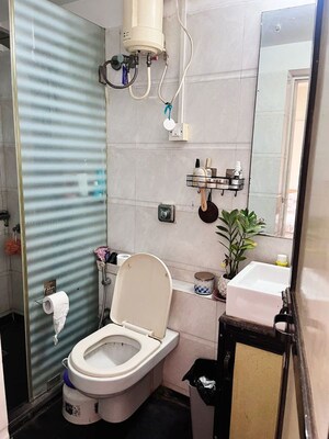 Bathroom in 2 BHK Apartment at Maharaja Retreat CHS, Goregaon East – for Rent