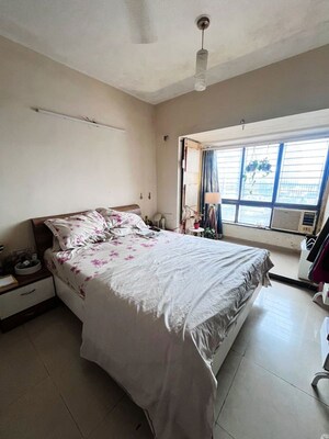 Bedroom in 2 BHK Apartment at Maharaja Retreat CHS, Goregaon East – for Rent