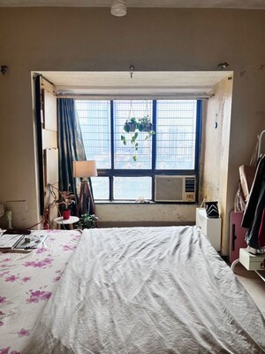 Bedroom in 2 BHK Apartment at Maharaja Retreat CHS, Goregaon East – for Rent