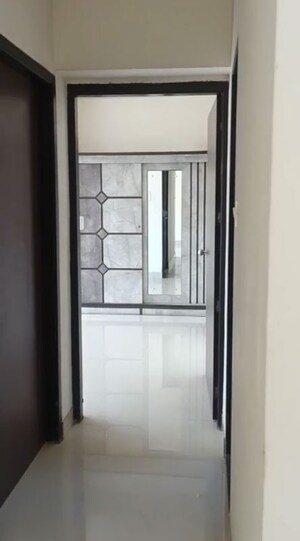 Building Lobby in 3 BHK Apartment at Conwood Enclave, Vasant Vihar – for Rent