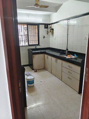 Kitchen in 3 BHK Apartment at Serenity Heights, Malad West – for Rent