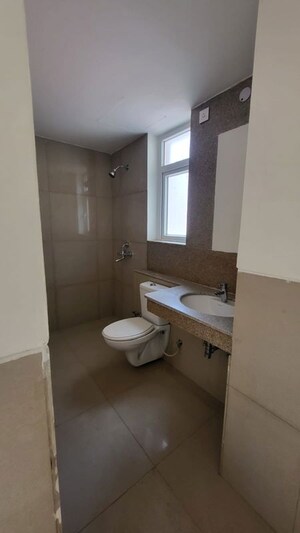 Bathroom in 3.5 BHK Apartment at Emaar Palm Gardens, Sector 83 – for Sale