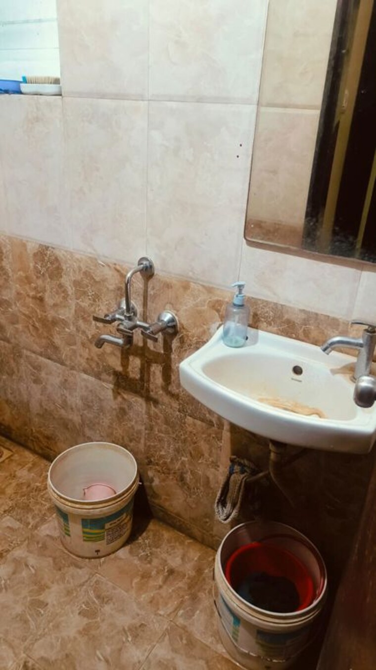 Bathroom, rahatani 2 Bedroom 670 Sq.Ft. Apartment In Rahatani Pune 10514442