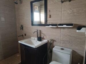 Bathroom in 4 BHK Apartment at Elite Golf Green, Sector 79 – for Rent