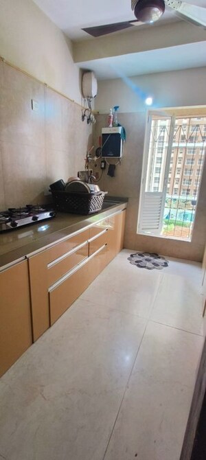 Kitchen in 2 BHK Apartment at Dosti West County Phase 2 Dosti Cedar, Balkum Pada – for Sale