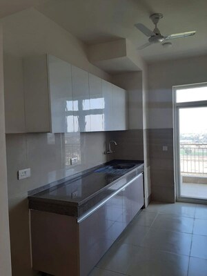 Kitchen in 3.5 BHK Apartment at Emaar Palm Gardens, Sector 83 – for Sale