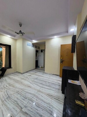 Bedroom in 1.5 BHK Apartment at Premraj CHS, Mulund East – for Rent