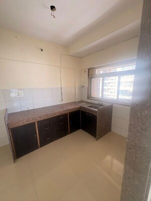 Kitchen in 2.5 BHK Apartment at Kanakia Spaces Niharika, Manpada – for Rent
