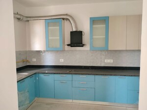 Kitchen in 2.5 BHK Apartment at Mahagun Moderne, Sector 78 – for Rent
